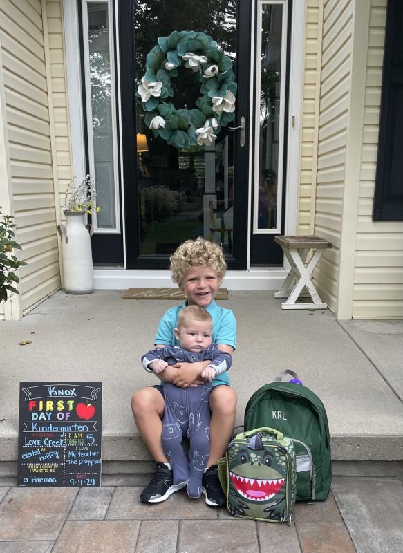 Little brother wanted to get in on the first day picture action! Love Creek kindergartener Knox Lougheed lovingly holds his brother, 3-month-old Forge Lougheed. KEVIN LOUGHEED PHOTO