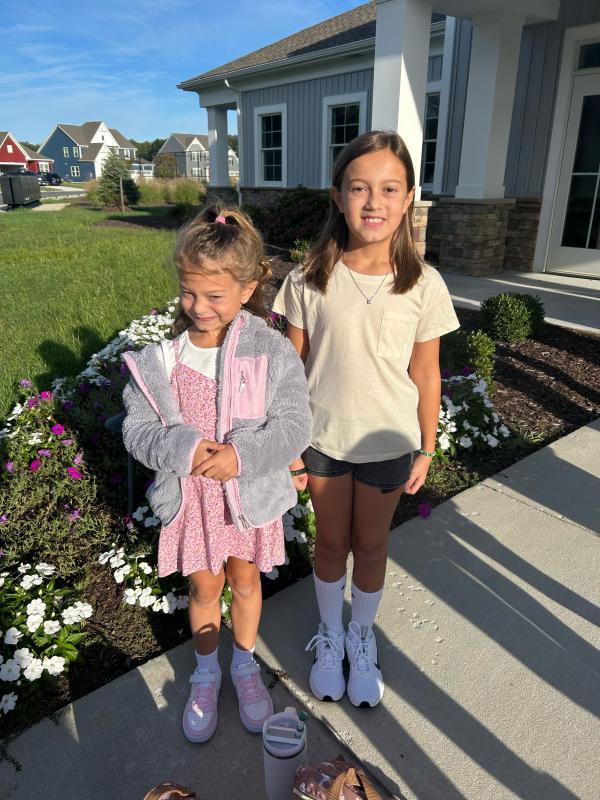 Second grader Vivian Heick, left, and fourth grader Emelia Heick gather before their first day at Love Creek Elementary. NICOLE HEICK PHOTO