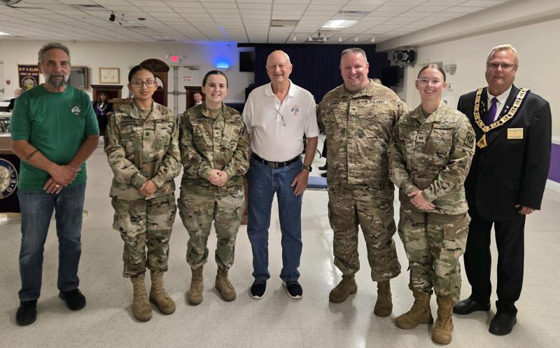 Gathered for the donation presentation are (l-r) Elks Veterans Committee member Dan Celia; Cadet Command Sgt Major Jazmine Ramos-Trejo; Battalion Executive Officer Cadet Maj. Abigail Schaeffer; Elks Veterans Committee Chair Robert Trafton; retired Col. Edward Dowgin, senior army instructor, Battalion Commander Cadet Lt. Col. Rylee Tipton; and Elks Exalted Ruler Buddy Hall-McBride. SUBMITTED PHOTO