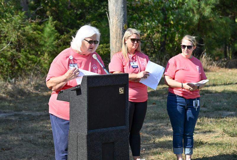 Terri Wyatt, RN, Walk to Remember coordinator, speaks to walk attendees as OB nurses Kelsi Warrington and Mariah Little Tull look on.