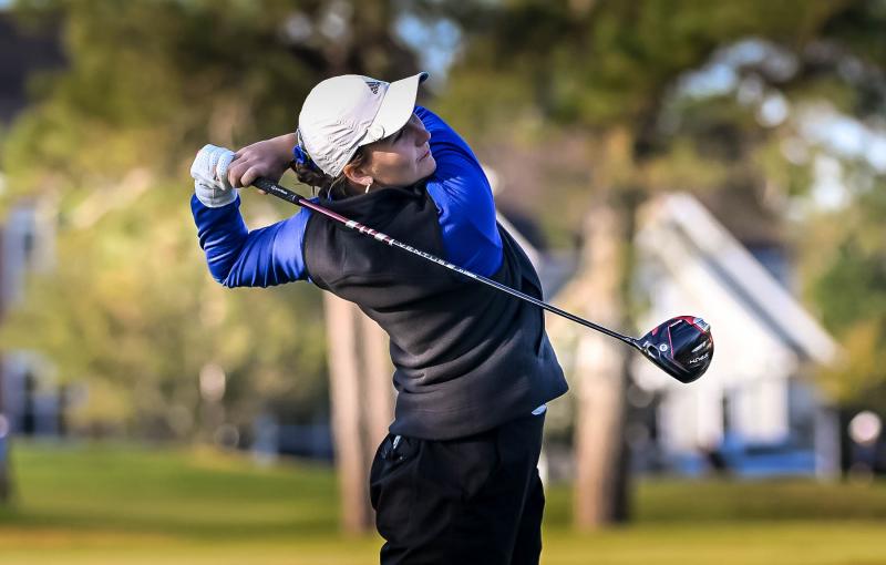 University of Delaware senior Alisa Khokhlova drives off the second hole. She successfully defended her 2023 title.