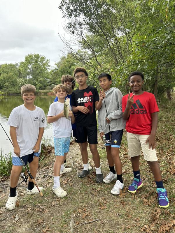 Celebrating the catch of the day are students (l-r) Marshall Sheetz, Dante Drummond, Augustus Gartenmann, Cameron Bell, Julian Kaufmann and Donshaye Wise. SUBMITTED PHOTO