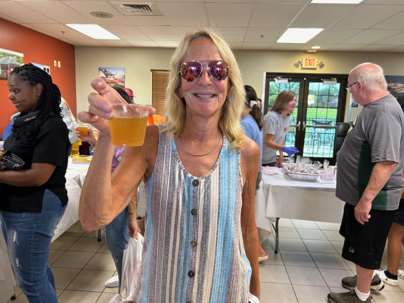 A perfect weather day allowed for thousands to attend the festival and get some cider, brightening the day of festival goers like Patty Coffield.