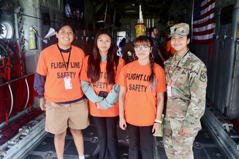 Sussex Central JROTC members (l-r) Kimberly Garcia-Sanvoval, Angie Diaz-Gomez, Diana Chilel and Carmen Perez-Arreaga tour the Delaware Air National Guard C-130.