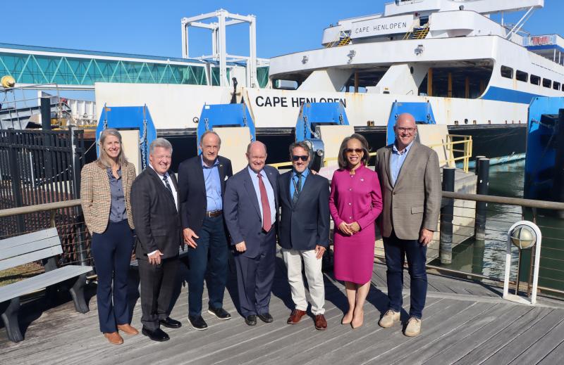 Delaware’s congressional delegation visited the Lewes ferry terminal Oct. 23, to announce a $20 million federal grant for a new ferry. Shown are (l-r) Valerie Berton, national communications director for the Federal Transit Administration; Thomas Cook, Delaware River & Bay Authority executive director; Sen. Tom Carper; Sen. Chris Coons; Heath Gehrke, DRBA director of ferry operations; Rep. Lisa Blunt Rochester; and state Sen. Russ Huxtable, D-Lewes. BILL SHULL PHOTO