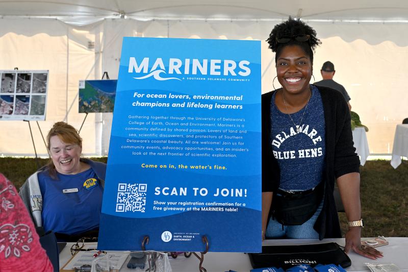 Robyn Ray, executive director of strategic initiatives, and Chadeia Buycks, senior associate director of development relations in the Office of Alumni Relations at the University of Delaware, are getting people signed up for Mariners, a southern Delaware community for ocean lovers.