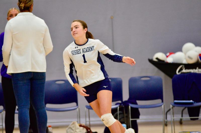 Seahawks senior Savannah Montgomery runs out of the player tunnel for the last time as a member of the Sussex Academy volleyball team.