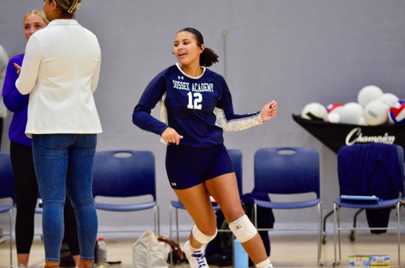 Sussex Academy senior Dymond Steele goes to join her teammates for the final time as a player on the Sussex Academy volleyball team.
