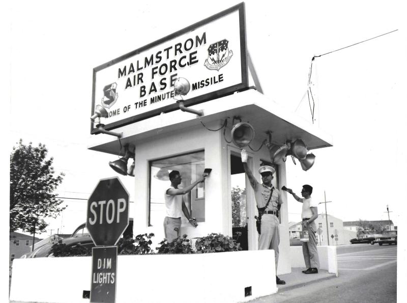 Ron Varano is shown reinforcing the stop sign while his fellow airman painted the security booth at Malmstrom Air Force Base in Montana. SUBMITTED PHOTO