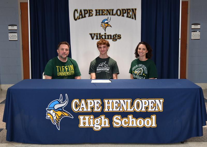 Ronan Presler signed to play lacrosse as Tiffin University. Shown are (l-r)
Jennifer, Ronan and Daniel Presler.