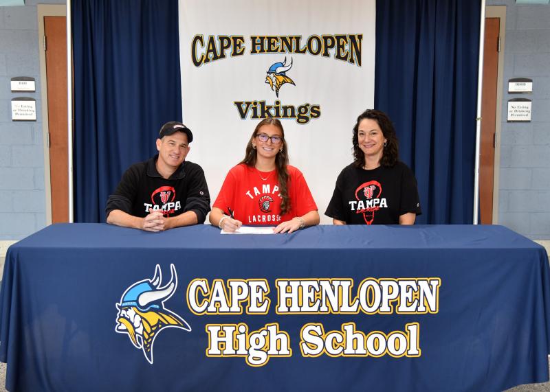 Quinn Nutter signed to play lacrosse at University of Tampa. Shown are (l-r) James, Quinn and Anna Nutter.