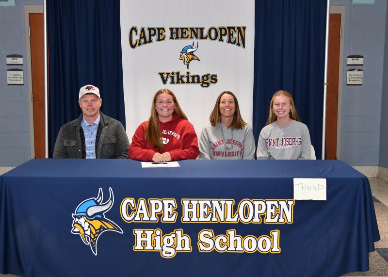 Alivia Heers signed to play softball at St. Joseph University. Shown are (l-r) Chad, Alivia, Amy and Grace Heers.