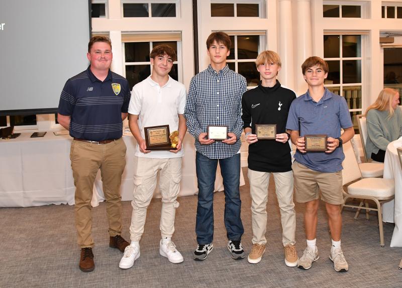 Cape JV coach Tyler Nichols stands with the JV Award winners. Shown are (l-r) Nichols, MVP Roberto Garcia, Offensive MVP Jackson Hess, JV Defensive MVP Colby Wheeler and Sportsmanship Award winner Pierce Conway.