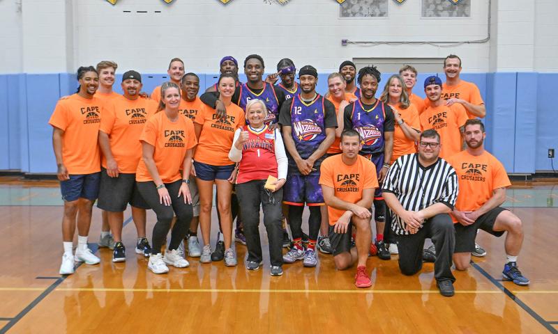 The Crusaders and Wizards pose together after the game. Among those taking part, shown are Trevor Reed, Cody Brees, Jason Feather, Katie Tingle, Eric Croce, Sheri Klemkowski, Pat Campbell-White, Lloyd Clinton, Bakari Copeland, Jonathan Hevalow, Joseph Bunce-Grenon, Robert Young, Kelly Hynes, (King) Arthur Lewis, Lisa Thorp, Samuel Luciano Solomon and Jason Murray. In front are Rob Scisco, Justin Marino and Jeff Munro.