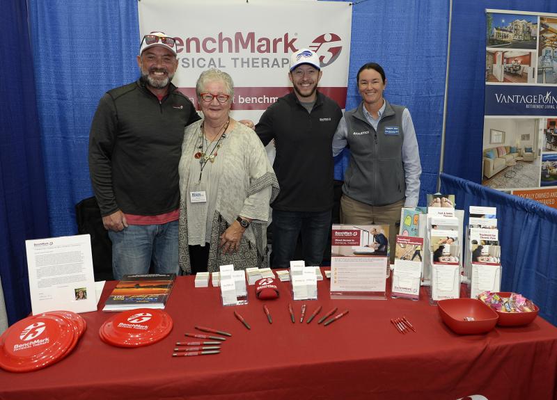 Benchmark Physical Therapy Account Manager Neil Little shares a booth with his friends. Shown are (l-r) Little, Delaware Beach Book Sales Rep Becky Carney, Benchmark PT Lewes Clinic Director Jimmy Graziano and Athletico PT Regional Director Katie Rickards.