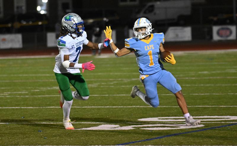 Cape running back Jayden Messick shakes off the tackle attempt by Hawks’ defensive back Emory Womack.