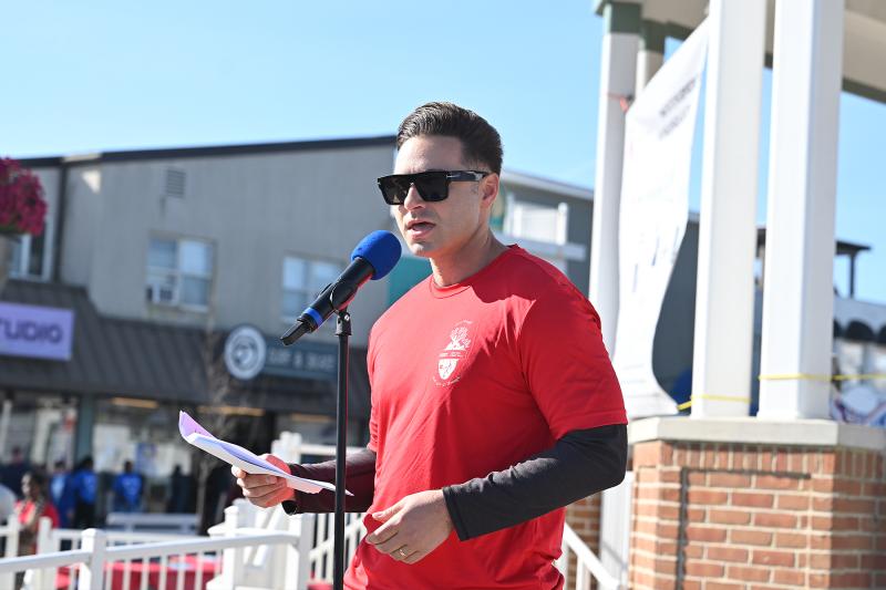 Tom Trobiano, executive director of Cardiovascular & Neuroscience Services at Beebe Healthcare, speaks to the crowd of walkers.