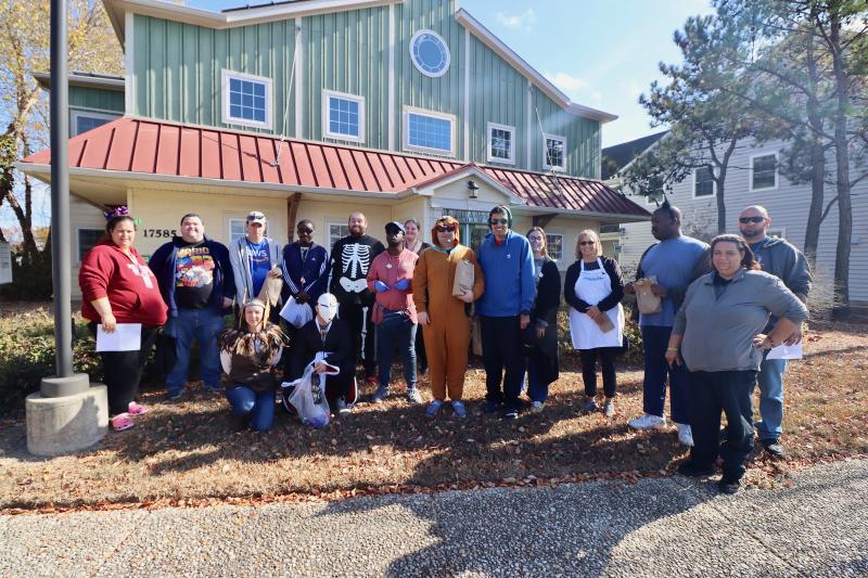 Participants and staff from Autism Delaware’s POW&R program in Lewes stopped by the Cape Gazette on their Halloween trick-or-treat route. Shown in back are (l-r) Amanda York, POW&R direct support professional; Daniel McHale, POW&R participant; Will Crist, POW&R participant; Esha Akemba, POW&R participant; Hunter Wiswall, POW&R participant;
Rachel McKelvey, POW&R direct support professional; Jerry Meece, POW&R participant; Rohan Patel, POW&R participant; Amanda Ebert, POW&R employment support professional;
Carole O'Rourke, POW&R direct support professional; Kevin Williams, POW&R participant; Dave Garrett, POW&R direct support professional; and Ashley Benson, POW&R direct support professional. In front are Jennifer Pulley, POW&R direct support professional, and Reed Bellinger, POW&R participant. BILL SHULL PHOTO