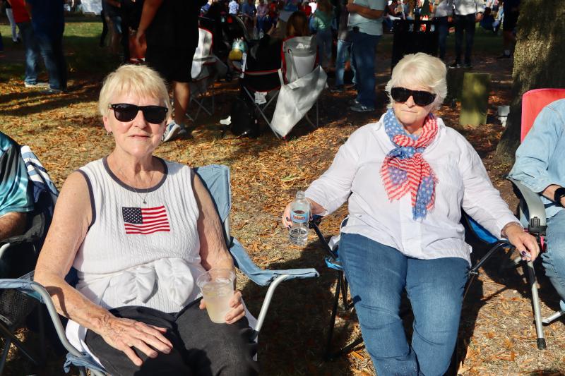 Barbara Holston, left, and Sharon Pitcher said they have been coming to Return Day for 50 years. They had a prime position on the Circle to watch the parade.