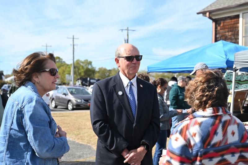 Rep. Jeff Hilovsky and his wife Marcia speak with Farrah Norwood-Stigall, assistant chief of the Nanticoke Tribe.