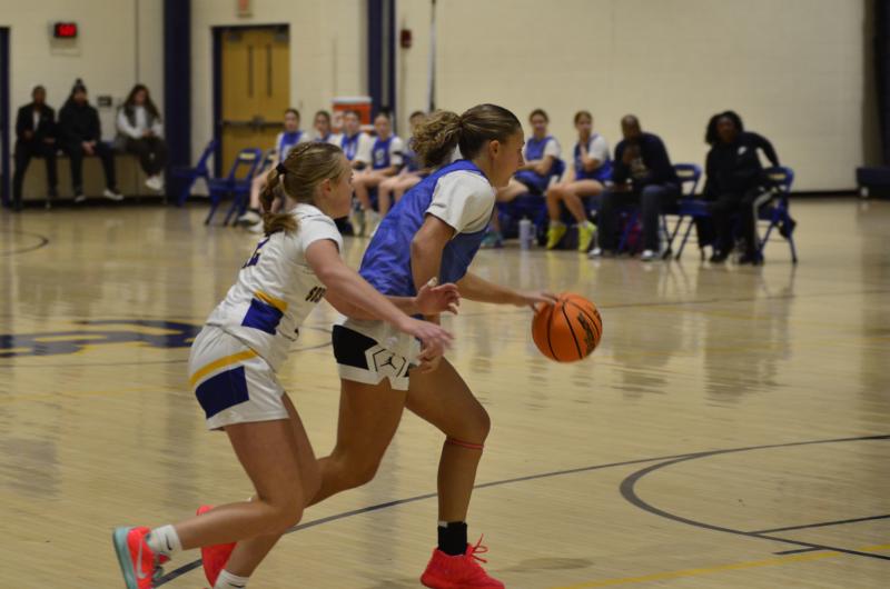 Sussex Central sophomore Ava Brock, a gifted cross country runner, is not used to being passed as Sussex Academy senior Emiley Bisaha did on this play.