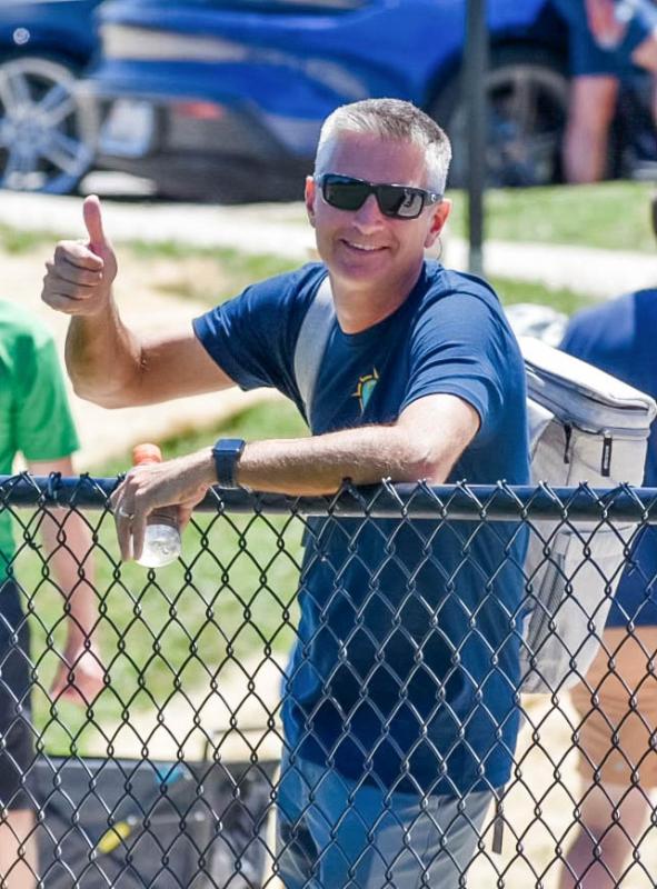 Bill Conway enjoys watching his sons during a Coastal lacrosse game this past summer. SUBMITTED PHOTO