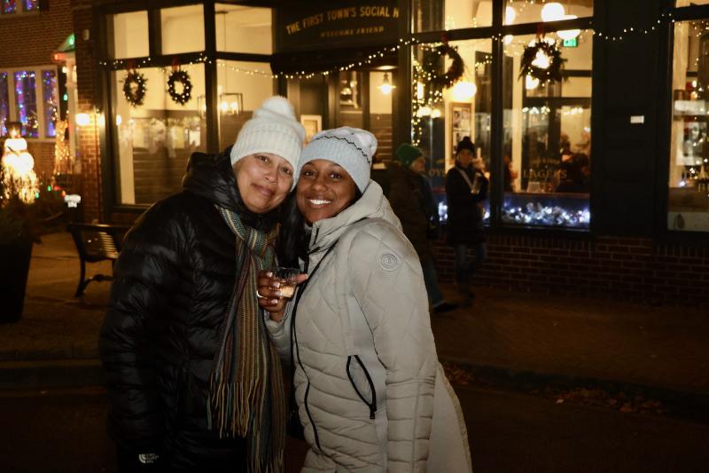 Gina Mifflin, left, and Janae Taylor of Lewes have fun on Second Street. They said they come every year to enjoy the people and the fun.