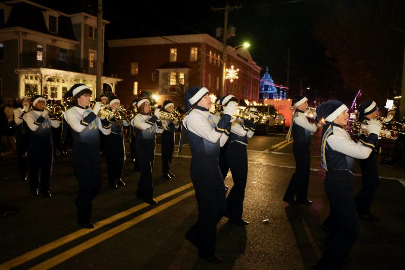 The Cape Henlopen High School marching band performs “Holiday Road” as they make the turn onto Second Street.