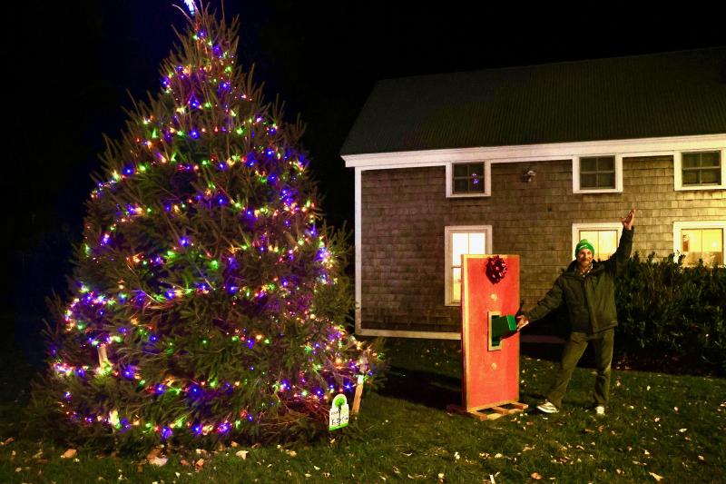 Following the parade, Lewes Mayor Andrew Williams flips the switch on the city’s Christmas tree in Zwaanendael Park. The tree was planted, not harvested, for the first time. It is expected to serve as the Christmas tree for years to come.