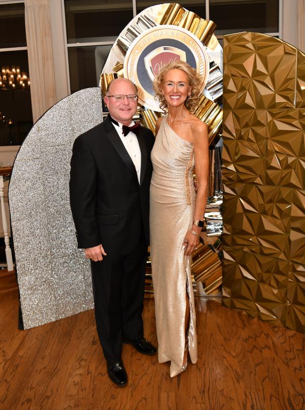 Tarrie Miller Ferguson, right, and her husband Dave pose for a portrait before the event. Miller acted as emcee for the gala.