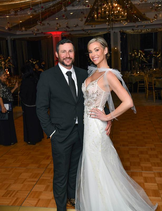 Ray Williams and Kathryn Hanlon celebrate their recent engagement at the event.