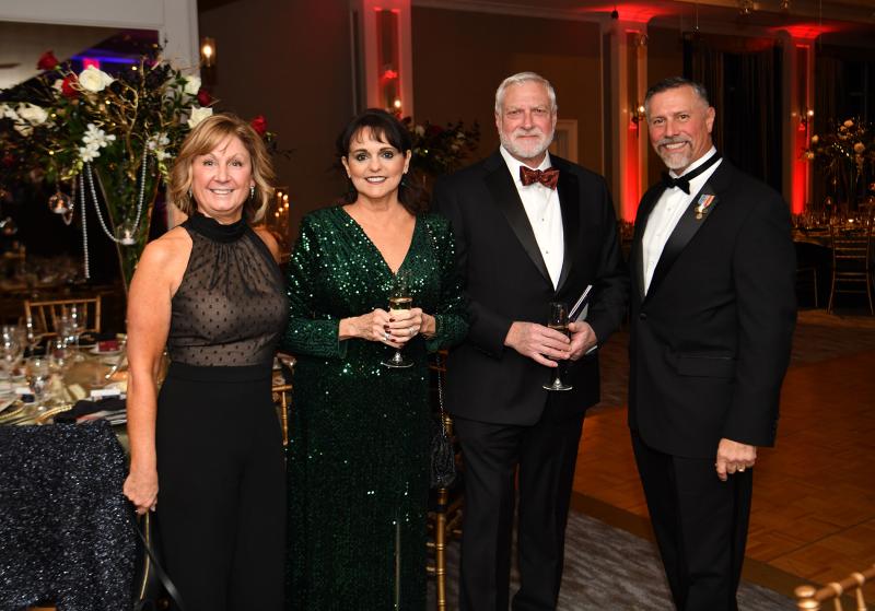 Shown enjoying happy hour are (l-r) Judy Smyk, Marci and Dan Urgo and Steve Smyk.
