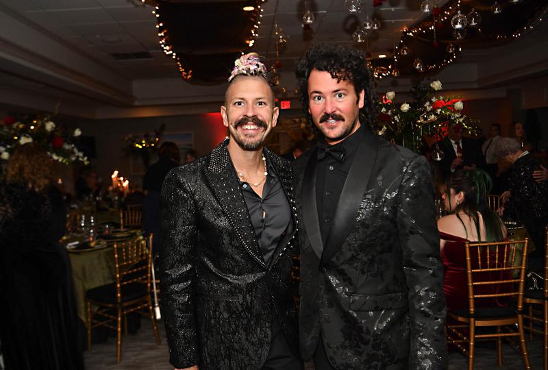Sharp-dressed men at the event are Dru Tevis, left, and Chase Cline.