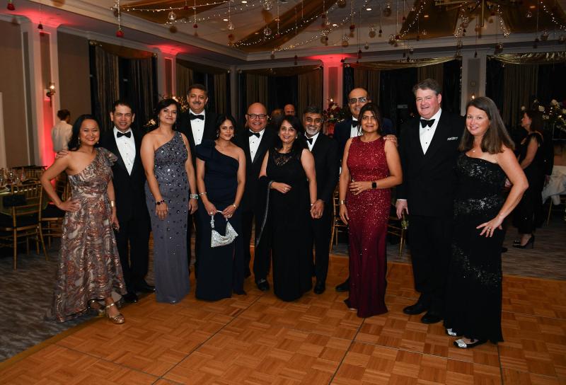 Enjoying the event are (l-r) Drs. Maria and Joydeep Haldar, Dr. Reetu Singh, Dr. Vikas Bhatra, Drs. Neepa and Uday Jani, Sonia and Harry Keswani, Drs. Menu and Shalini Shegal, and Jay and Tara Becker.