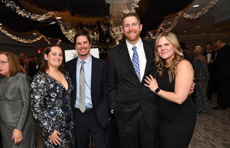 Enjoying the evening are (l-r) Vicki and Billy Suess and Matt and Meghan King.