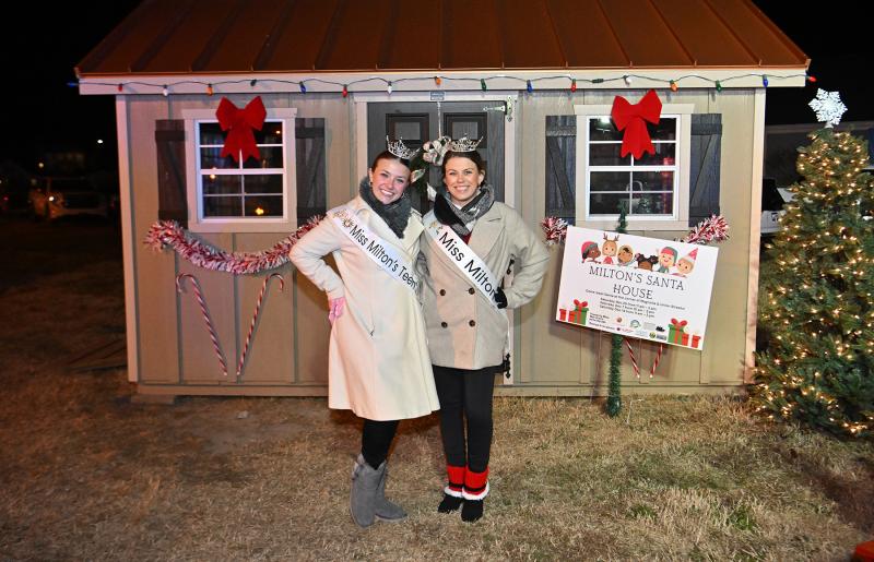 Carly Favoroso, left, Miss Milton’s Teen 2025, and Courtney Russum, Miss Milton 2025, pose at the Santa Claus house where Santa and Mrs. Claus will hear children’s Christmas hopes and dreams.