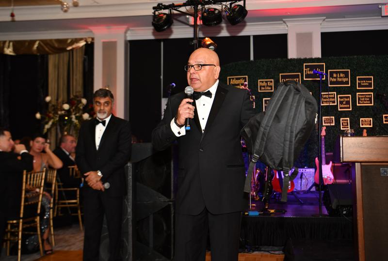 Dr. Uday Jani runs the backpack challenge.