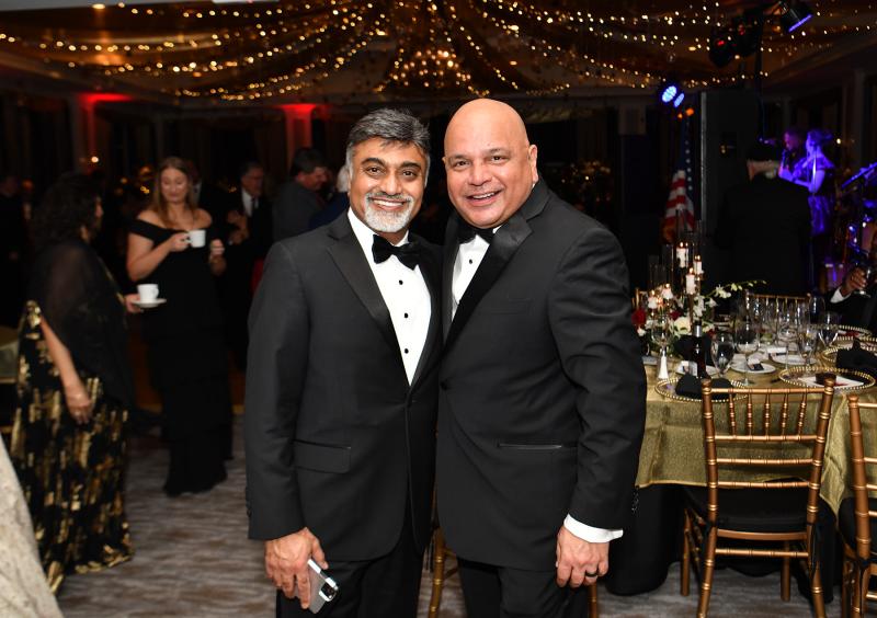 Harry Keswani and his good friend Dr. Uday Jani pose together at the event. Jani heads up the backpack challenge at the event.