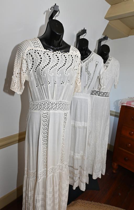 On display in the Maull House are beautiful lightweight dresses suitable for summer wear in the 19th century.