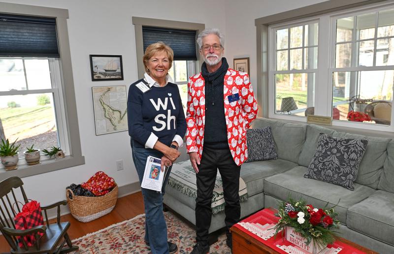 Holiday House Tour Chair Bill Quinn, right, and volunteer Sue Baker visit the home of Peggy Shemonski and Ron Colison at 100 Seaglass Drive in Lewes.