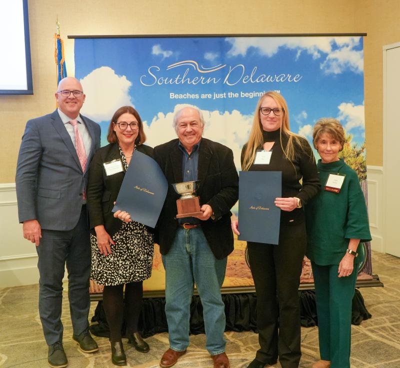 Coastal Delaware Running Festival was named Best Event. Shown are (l-r) Sen. Russ Huxtable, D-Lewes; Rep. Claire Snyder-Hall, D-Rehoboth Beach; Focus Multisports owner Ernie Felici; Geni King; and Rehoboth Beach-Dewey Beach Chamber of Commerce President Carol Everhart.