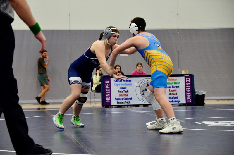 Sussex Academy seventh-grader Kaylan Hendershot keeps her leverage against Vikings eighth-grader Logan Smith.
