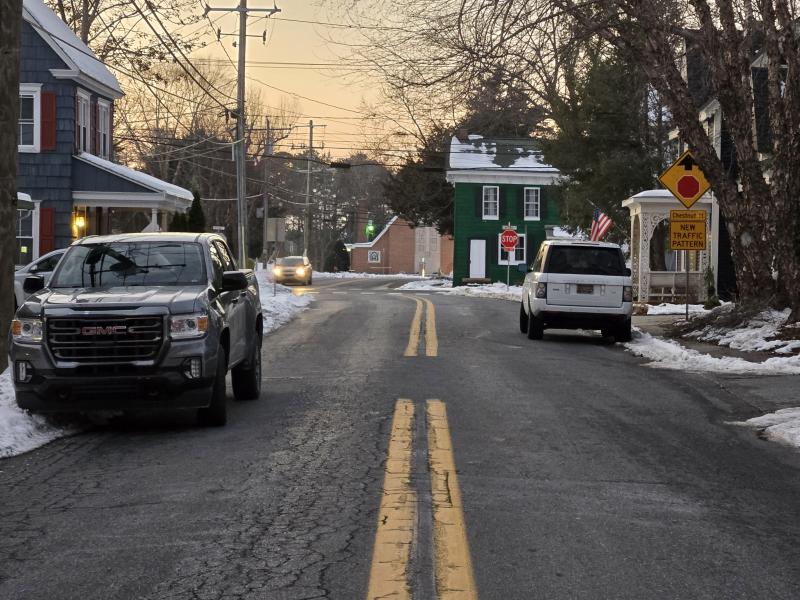 Joel and Kelly DeMott have taken to parking their vehicles legally near their house on Atlantic Street in Milton to slow speeding vehicles. Their efforts to shame speeders on social media has drawn backlash. Milton Mayor John Collier said he has plans for a solution that he will present next month. CHRIS FLOOD PHOTO