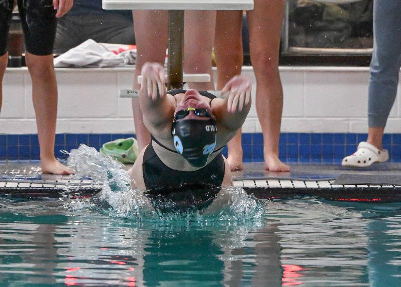 Cape senior Jenna Reinhold leaves the blocks to start the 200 medley rely. She and teammates Zoey Neufeld, Mia Jaoude and Isla Touw won in 1:59.82.
