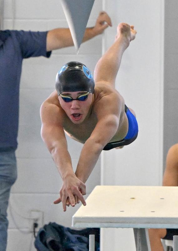 Cape freshman Jaxen Edwards leaves the blocks in the 200 individual medley. He won the event with a time of 2:00.31.