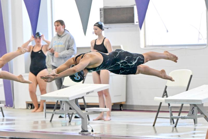 Cape sophomore Mia Jaoude leavs the blocks in the 100 butterfly. She took first in the event with a time of 59.68.