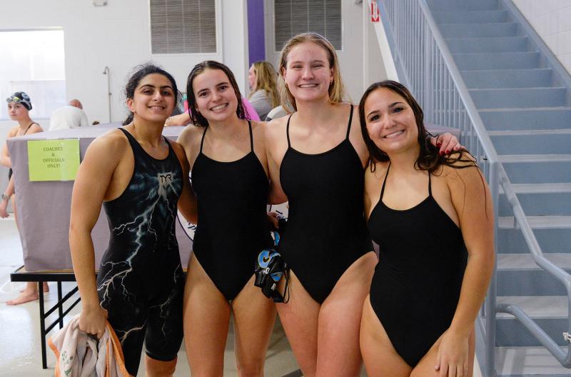 Cape won the 200 free relay with a time of 1:46.01. Shown are (l-r) Mia Jaoude, Isla Touw, Jenna Reinhold and Sidney Caldwell.