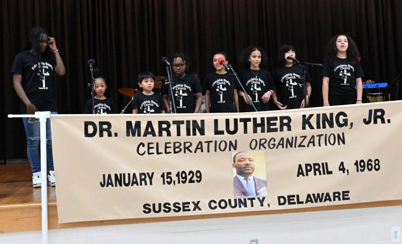 The Friendship Baptist Youth Choir sings “Shake the Devil Off.” Shown are (l-r) Ayanna Ward, Milan Barnes, Jackson Gao, Nore Sheppard, Mylah Sheppard, Aries Gooner, Genie Chen and Ka’Leah Sheppar.