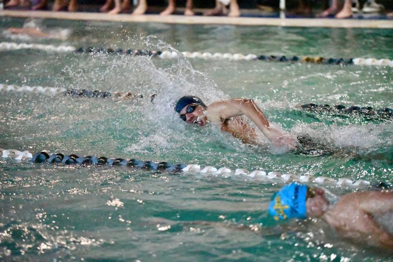 Christian Wright, shown swimming against Cape last year, starts his day in the Sussex Academy pool and ends it at the Sussex Family YMCA pool.