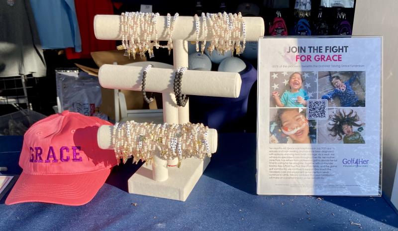 Items for sale for the Golf4Her Saving Grace Fundraiser at the 2024 ShopRite LPGA Classic included friendship bracelets and hats.